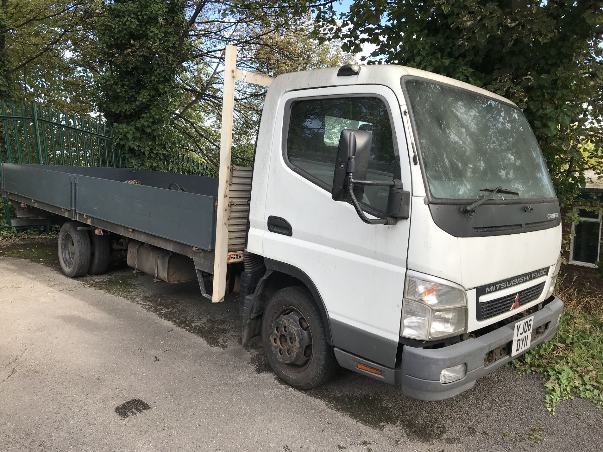 Mitsubishi Fuso Canter Dropside Wagon, registration no. YJ06 DYN, date first registered 27/03/