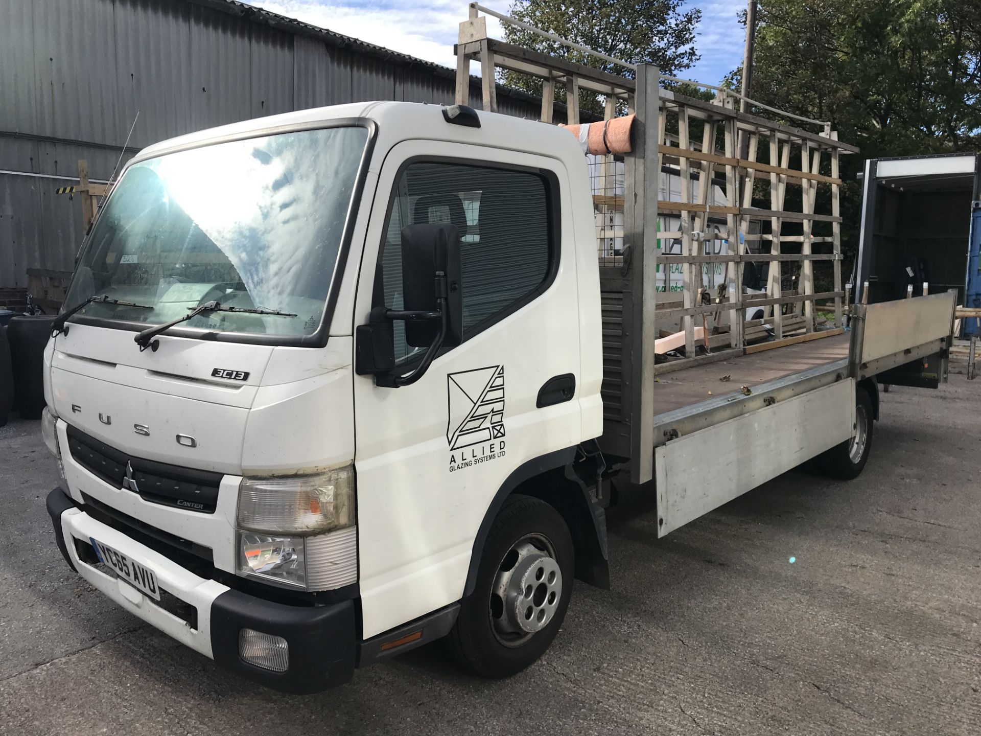 Mitsubishi Fuso Canter 3C13 Dropside Wagon, with fitted glass rack, registration no. YC65 AVU, - Image 2 of 7