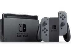 Mixed Lot of Four Refurbished Games Consoles, including Three Nintendo Switch games console in grey,