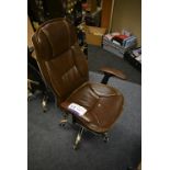 Brown Leather Effect Upholstered Swivel Armchair (