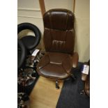 Brown Leather Effect Upholstered Swivel Armchair (