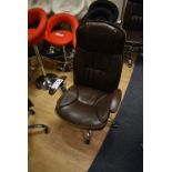 Brown Leather Effect Upholstered Swivel Armchair (