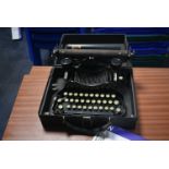 Corona Portable Typewriter, with carry case (note