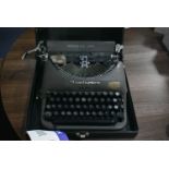 Remington Rand Portable Typewriter, with carry cas