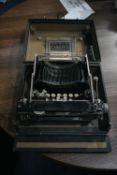 Corona Portable Typewriter, with carry case (note