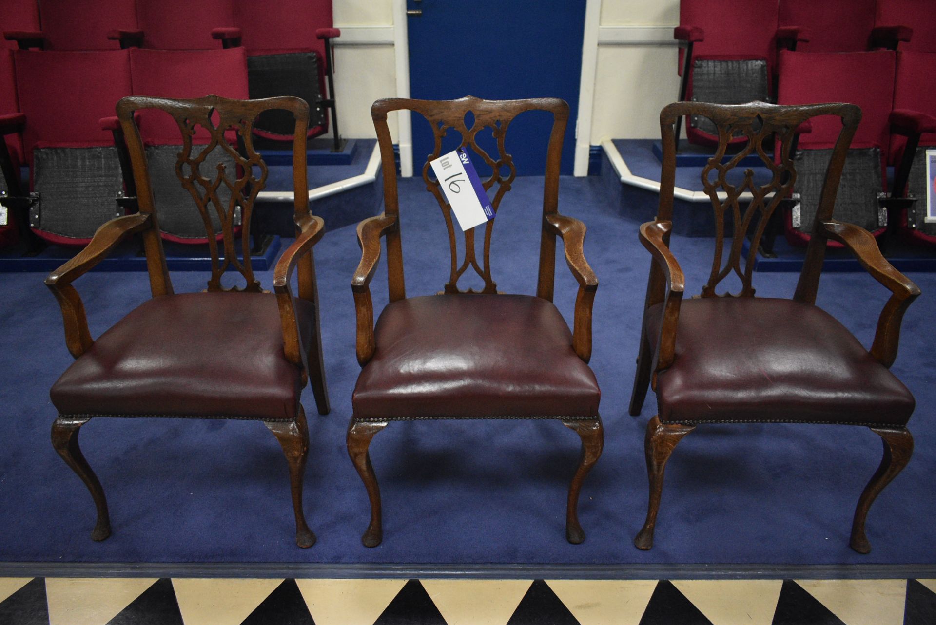 THREE MATCHING WOOD FRAMED LEATHER UPHOLSTERED ARMCHAIRSPlease read the following important