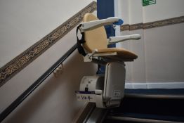 Handicare Stairlift, with track, approx. 2.3m long and two remote controlsPlease read the