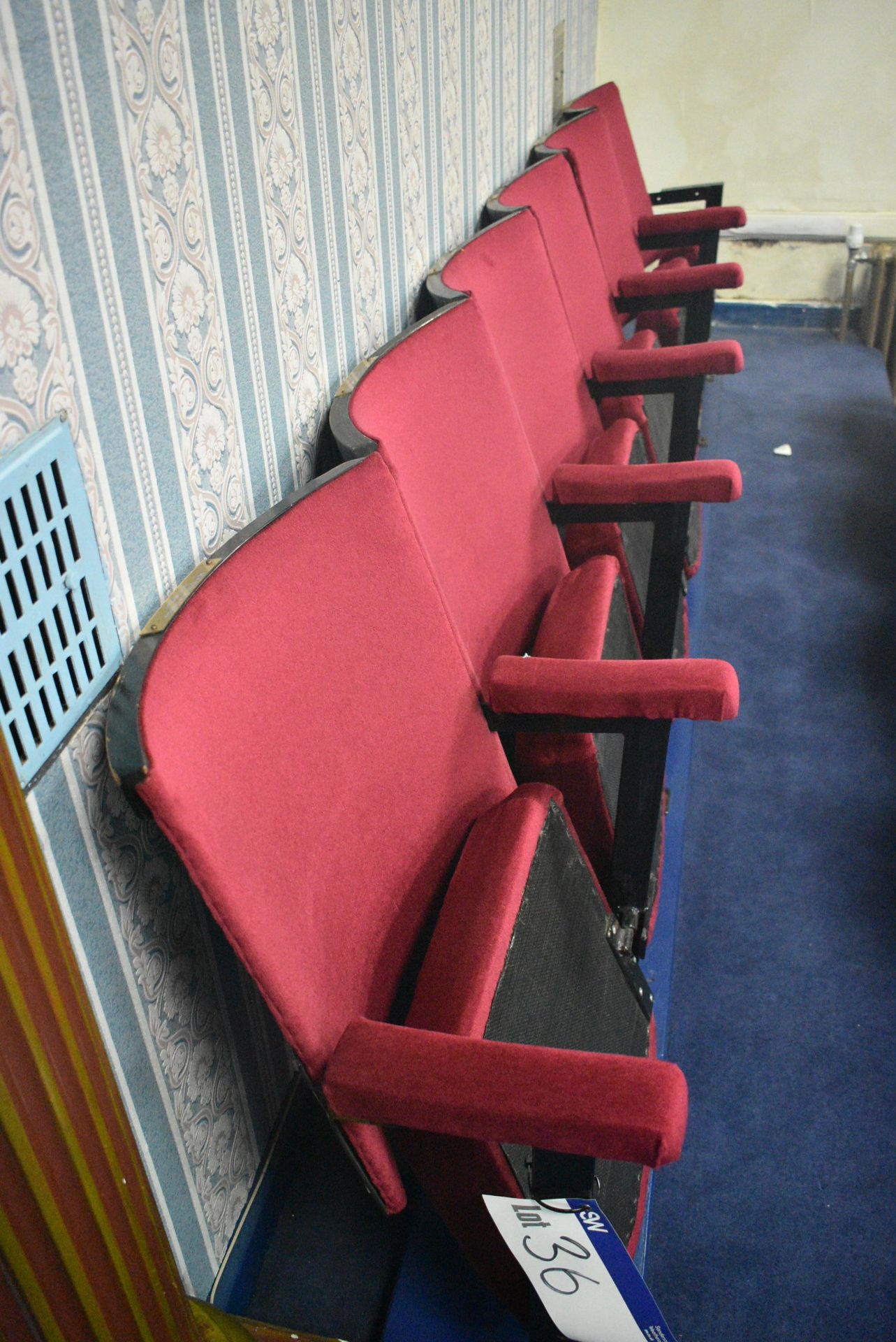 Bank of Six Red Fabric Upholstered Fold-up Seats, 3.1m wide overallPlease read the following