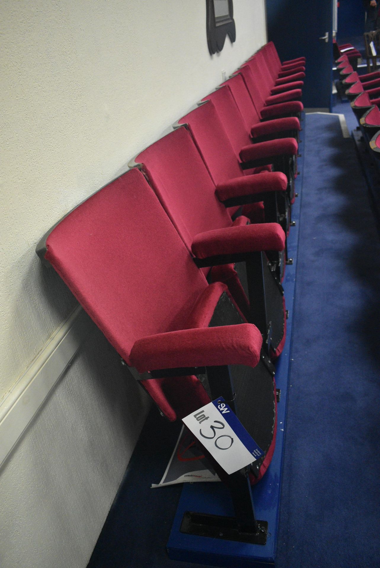 Bank of 11 Red Fabric Upholstered Fold-up Seats, 5.64m wide overallPlease read the following - Image 3 of 4