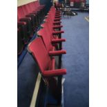 Bank of Ten Red Fabric Upholstered Fold-up Seats, 5.2m wide overallPlease read the following