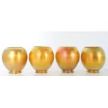 Set of (4) Steuben Gold Iridescent Shades