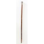 Sterling Silver and Carved Wood Cane