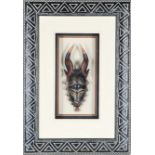 African Carved Wooden Mask in Frame