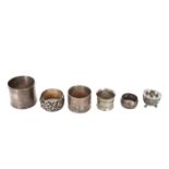 (5) Silver Napkin Rings and a Footed Silver Dish