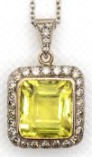 Anhänger 750er GG, Lemon-Topas von 15,04 ct, Kette aus 750er Weißgold, Brillanten in Rahmung und Ös