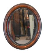 Spiegel, 20. Jh., ovaler Holzrahmen, facettiertes Glas, 59x49 cm