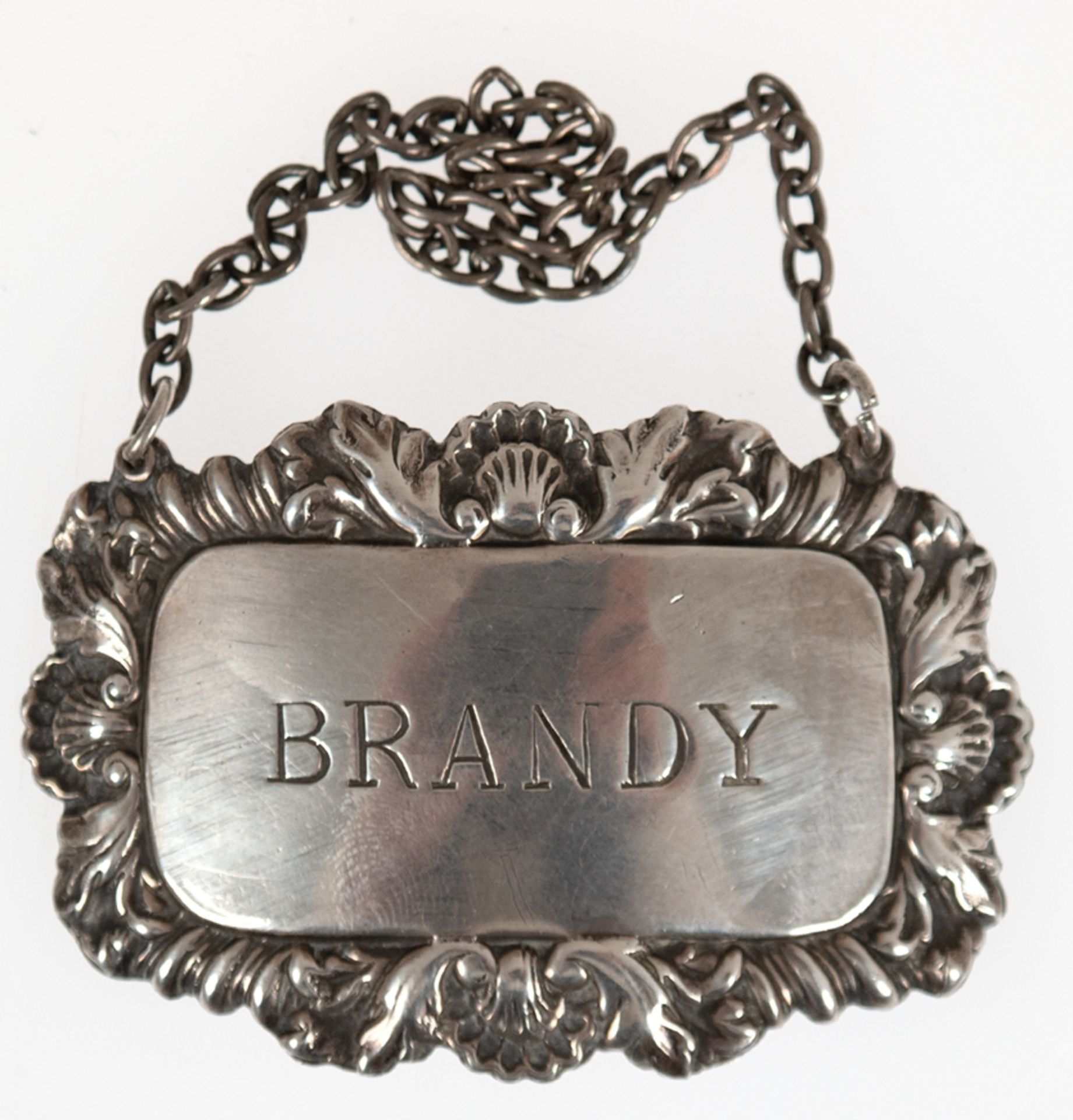 Flaschenschild "Brandy", Birmingham 1957, Silber, punziert, Reliefkante, 6x4 cm