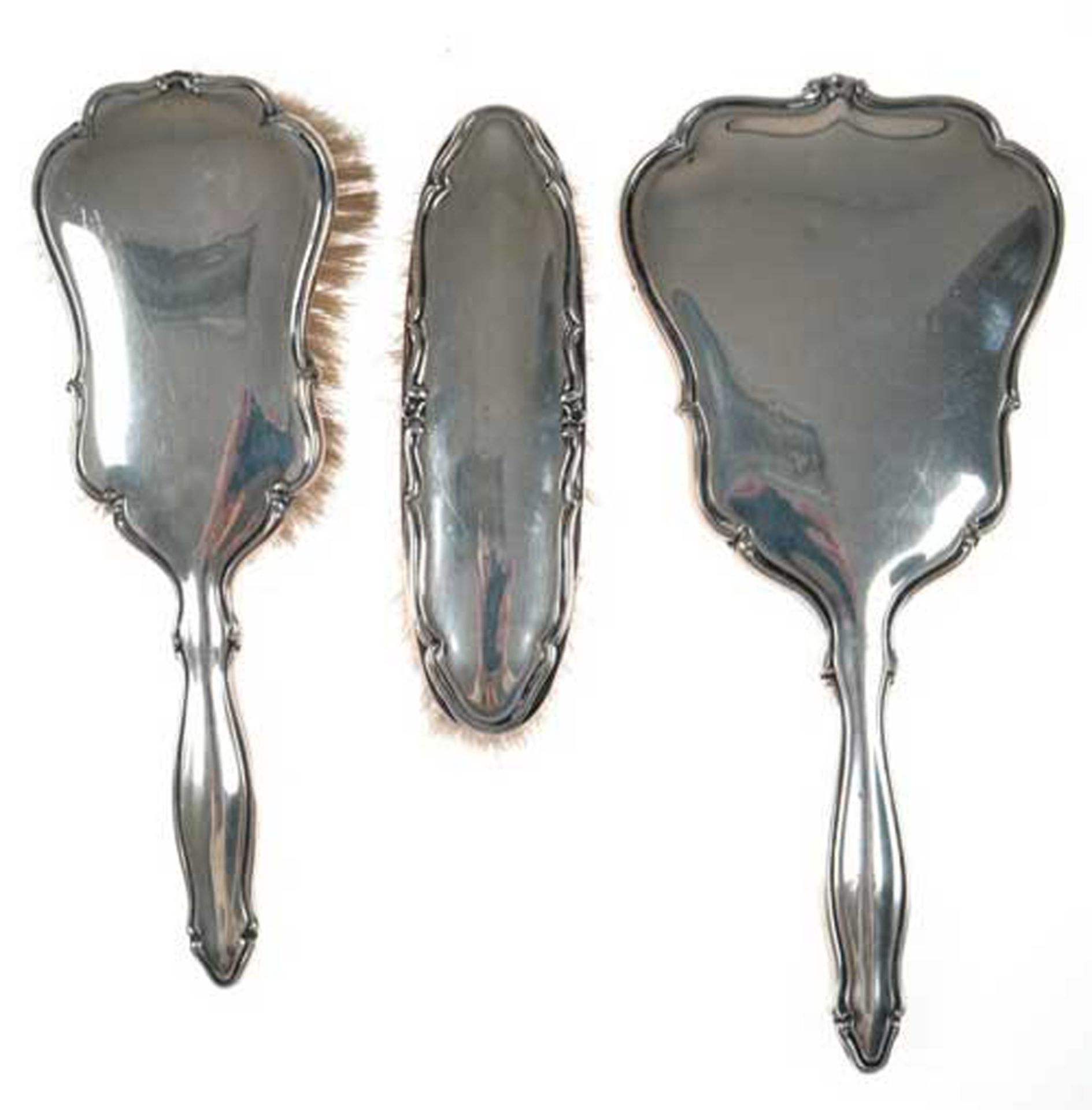 Set aus Bürste, Kleiderbürste und Handspiegel, 835er Silber, geschweifter Profilrand, Gebrauchspure
