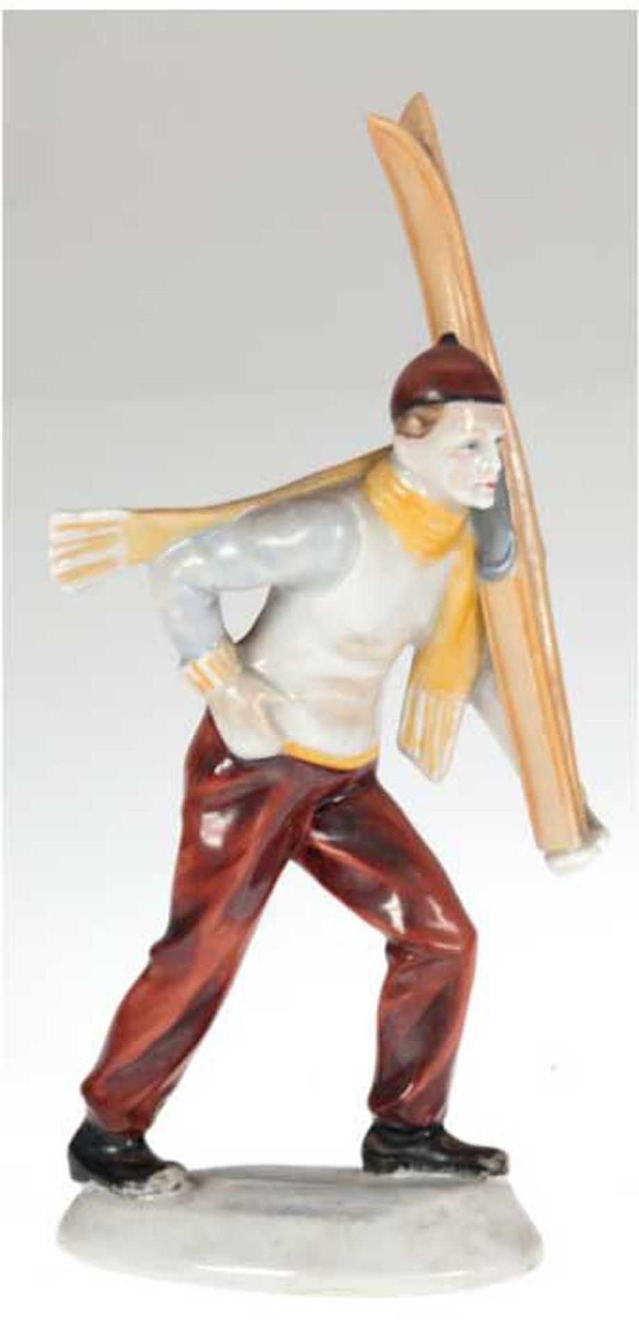 Porzellanfigur "Skiläufer, seine Ski auf der Schulter tragend", Metzler & Ortloff, polychrom bemalt