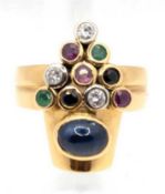 Ring, 750er GG, besetzt mit 1Saphircabochon von 1,15 ct, 2 Saphiren, 3 Rubinen, 2 Smaragden und 3 B