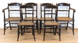 4 Stühle und 2 Armlehnstühle, um 1930, Buche, dunkel gebeizt, gedrechselte, verstrebte Beine, Sitz 