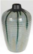 Keramik-Vase, Holland, unterseitig gemarkt, bauchiger Korpus, mit Laufglasur, H. 28 cm