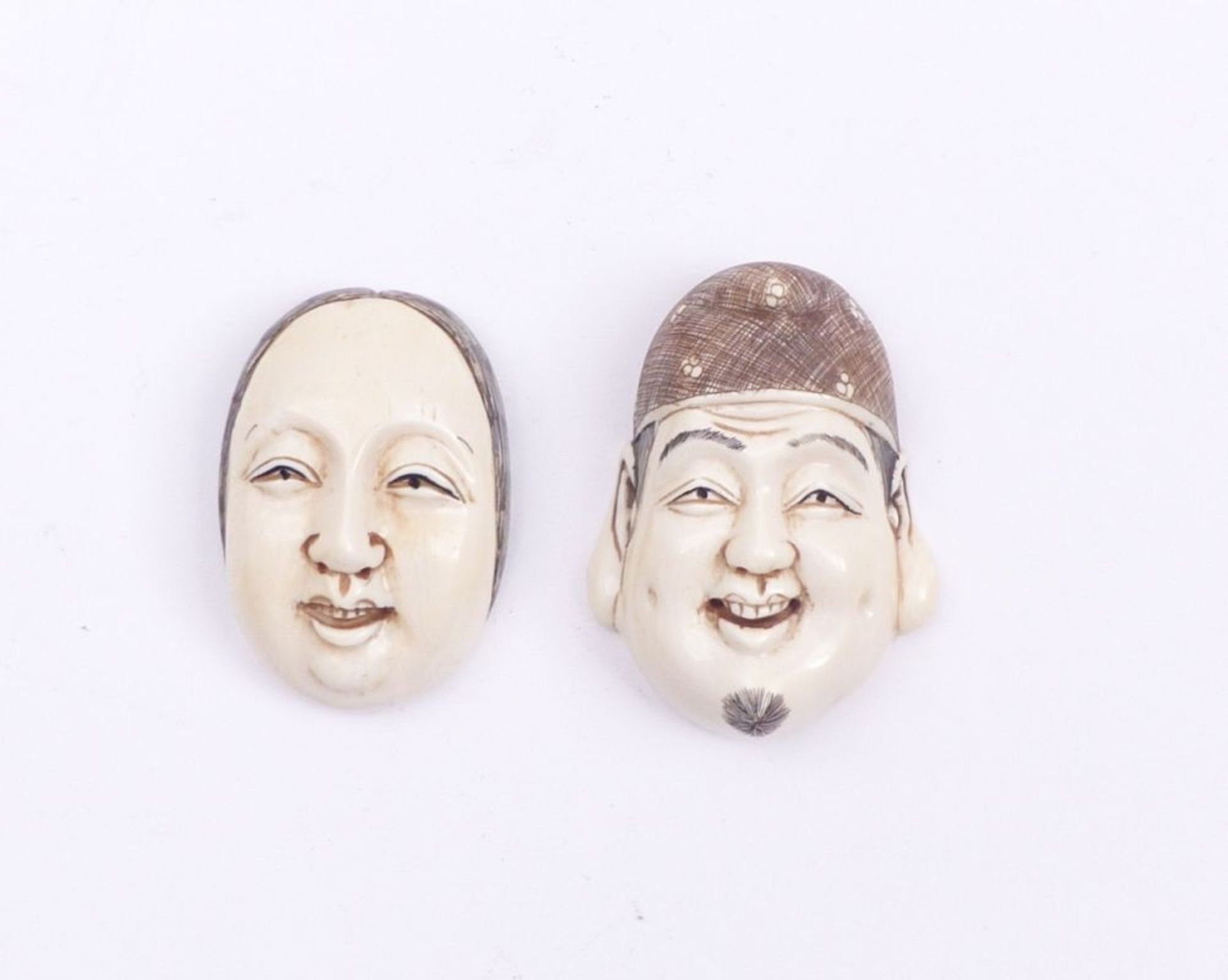 Zwei Masken-Netsuke (men)
