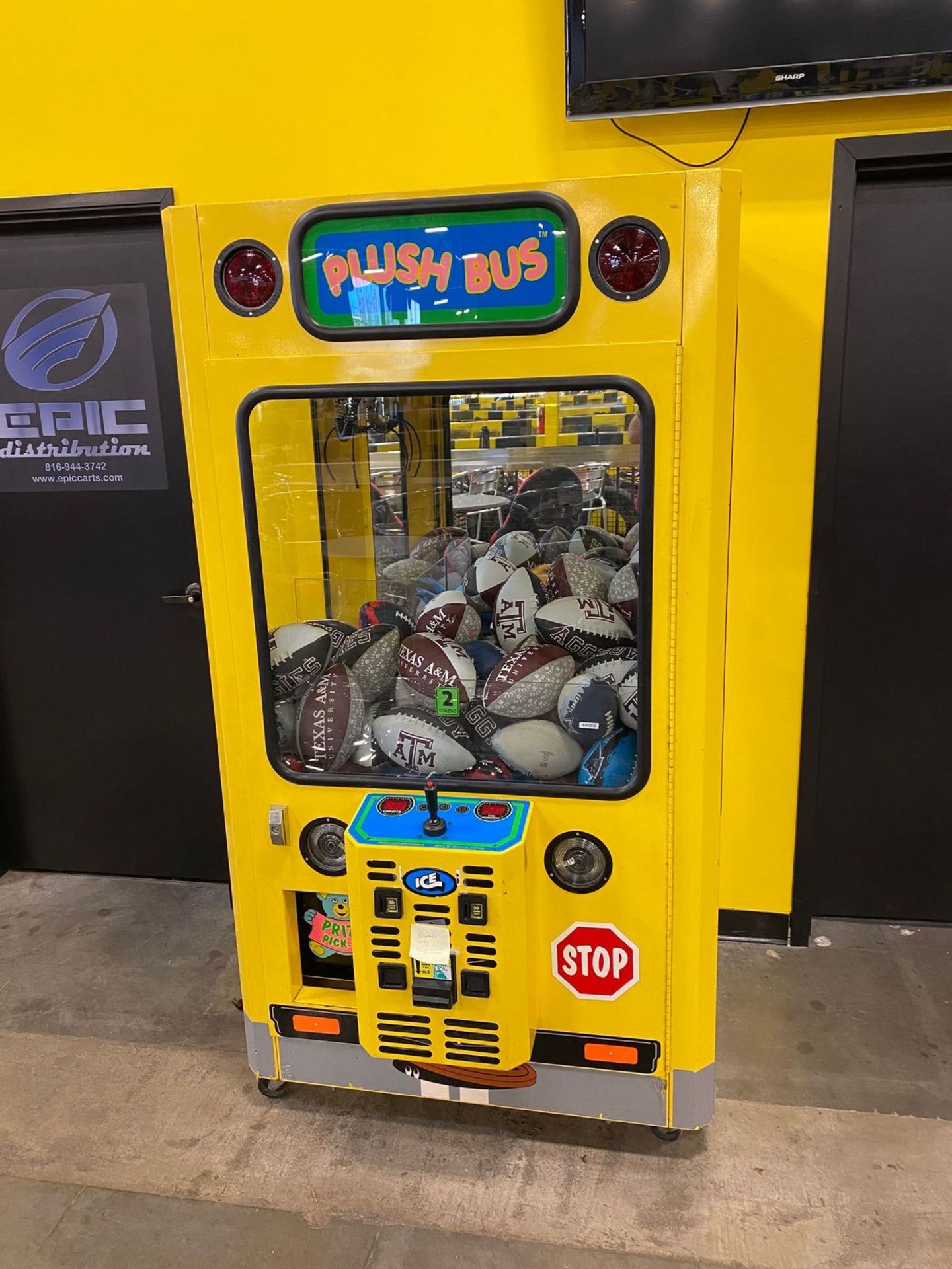 Plush Bus Claw Game, (toys inside are TX & Football Related), Takes Quarters