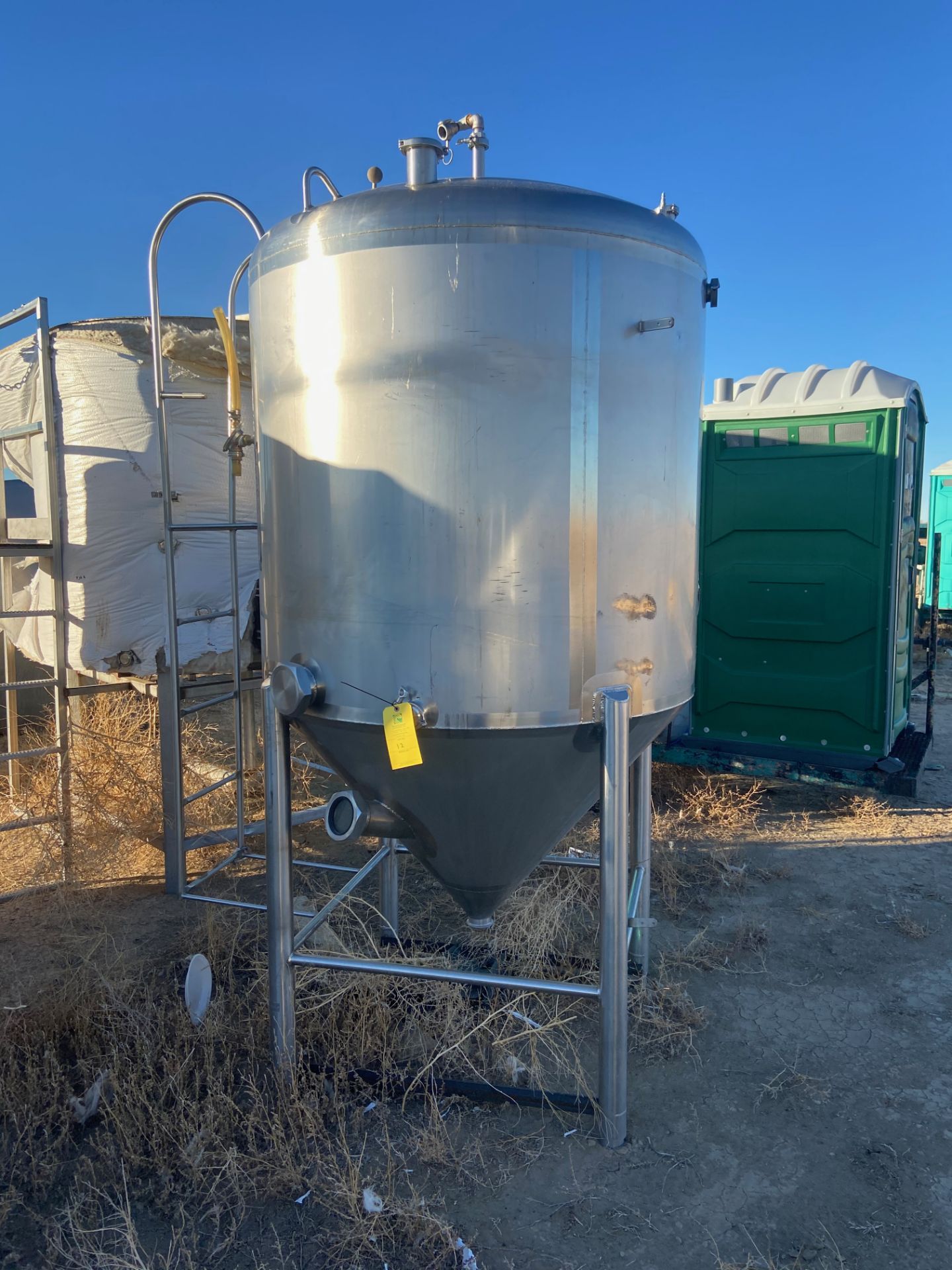 Walker Stainless Steel Conical Tank with ladder and manhole access, 500 Gal, Serial# 4410, Rigging/