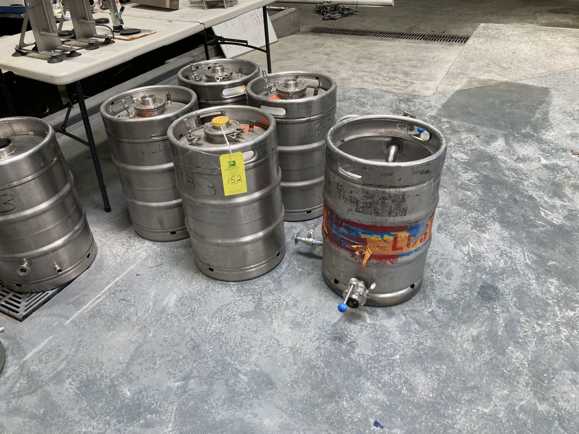 LOT OF 6, 5 Sankey retrofit 1/2 barrel kegs and 1 submergible pump Rigging fee of __$100__ to be