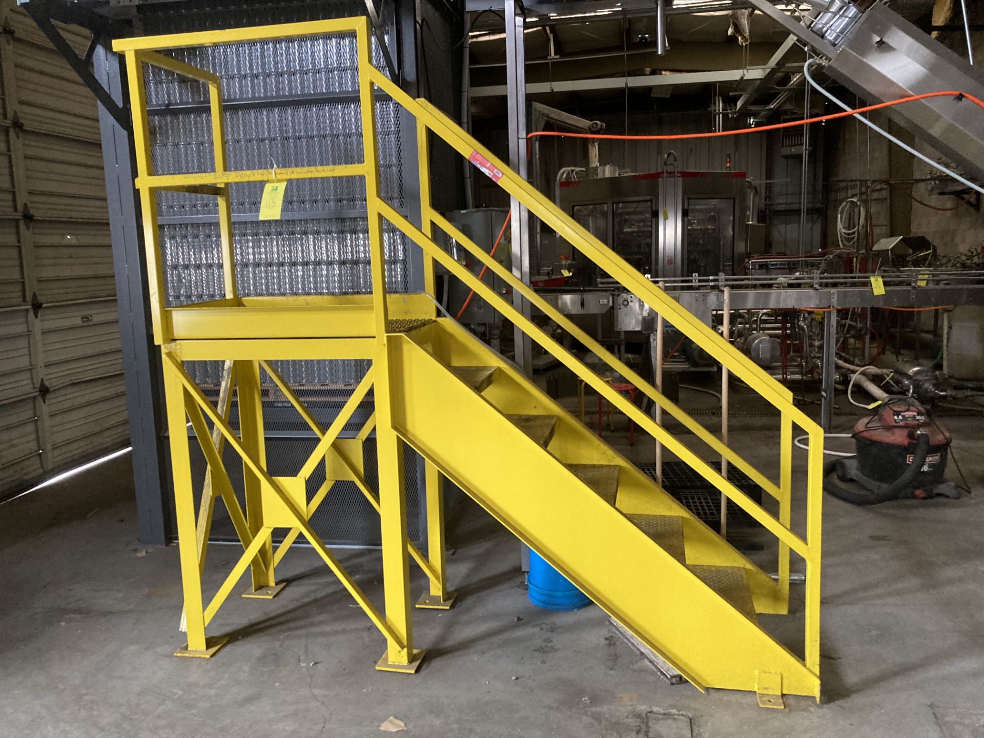 Metal construction stair with hand railing , 24 in x 36 in platform area, 50 in hgt Rigging fee of