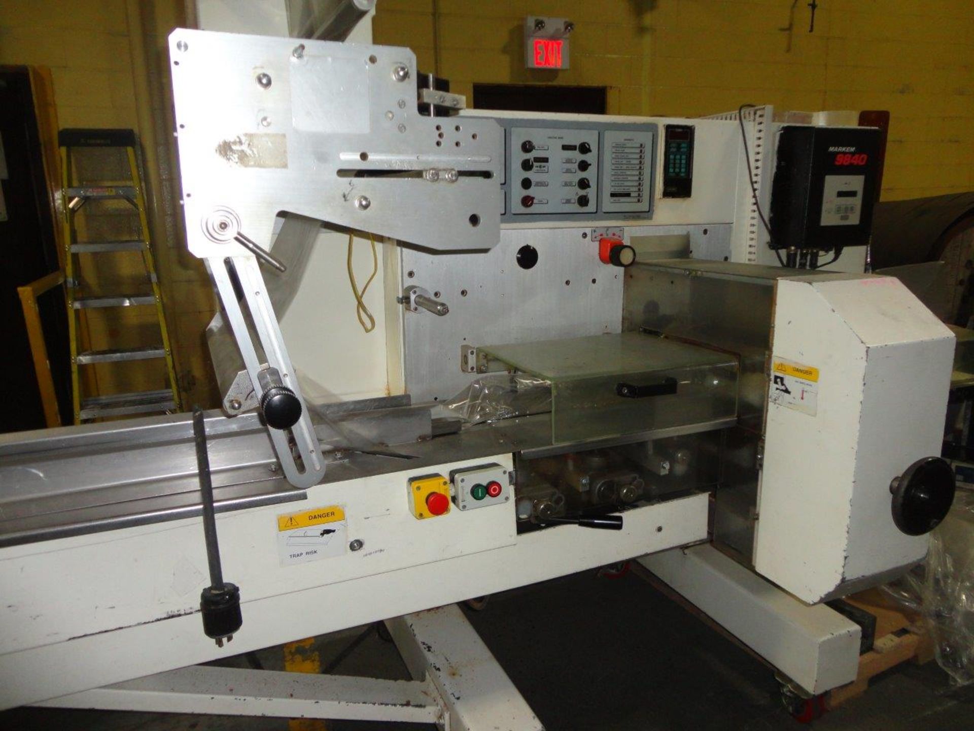 PFM Falcon Flow Wrapper, Serial #4351, 220v, 2.1amp., c/w Markem 9840 coder, in good condition, last