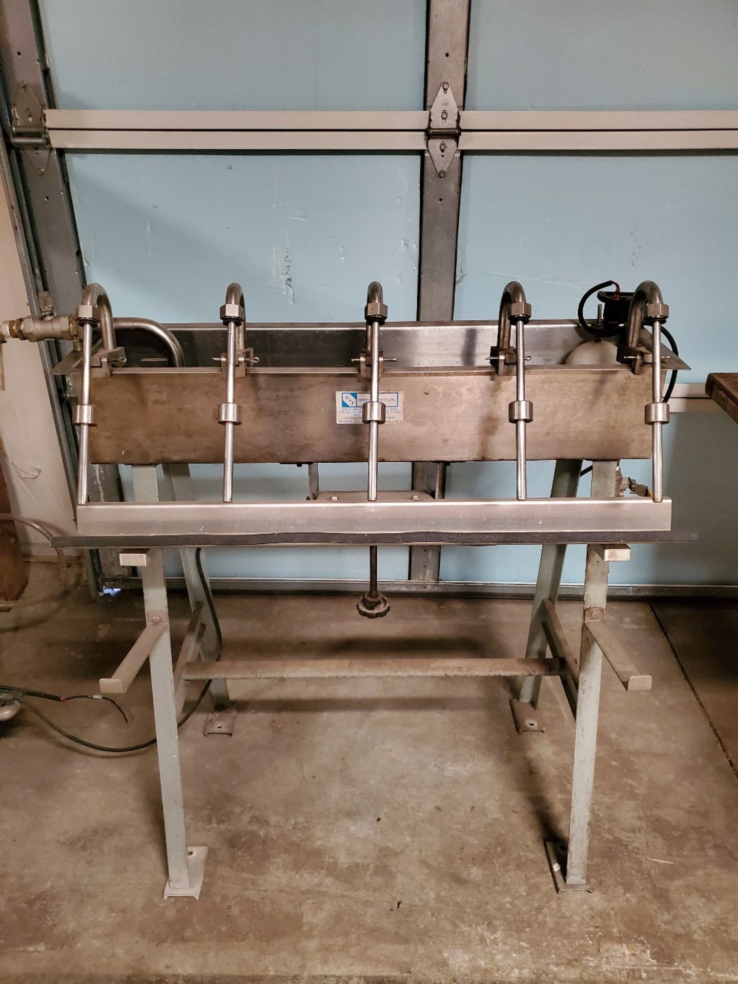 5-head gravity fed bottler, by G&F manufacturing co ***Note from Auctioneer*** __NO LOADING FEE /