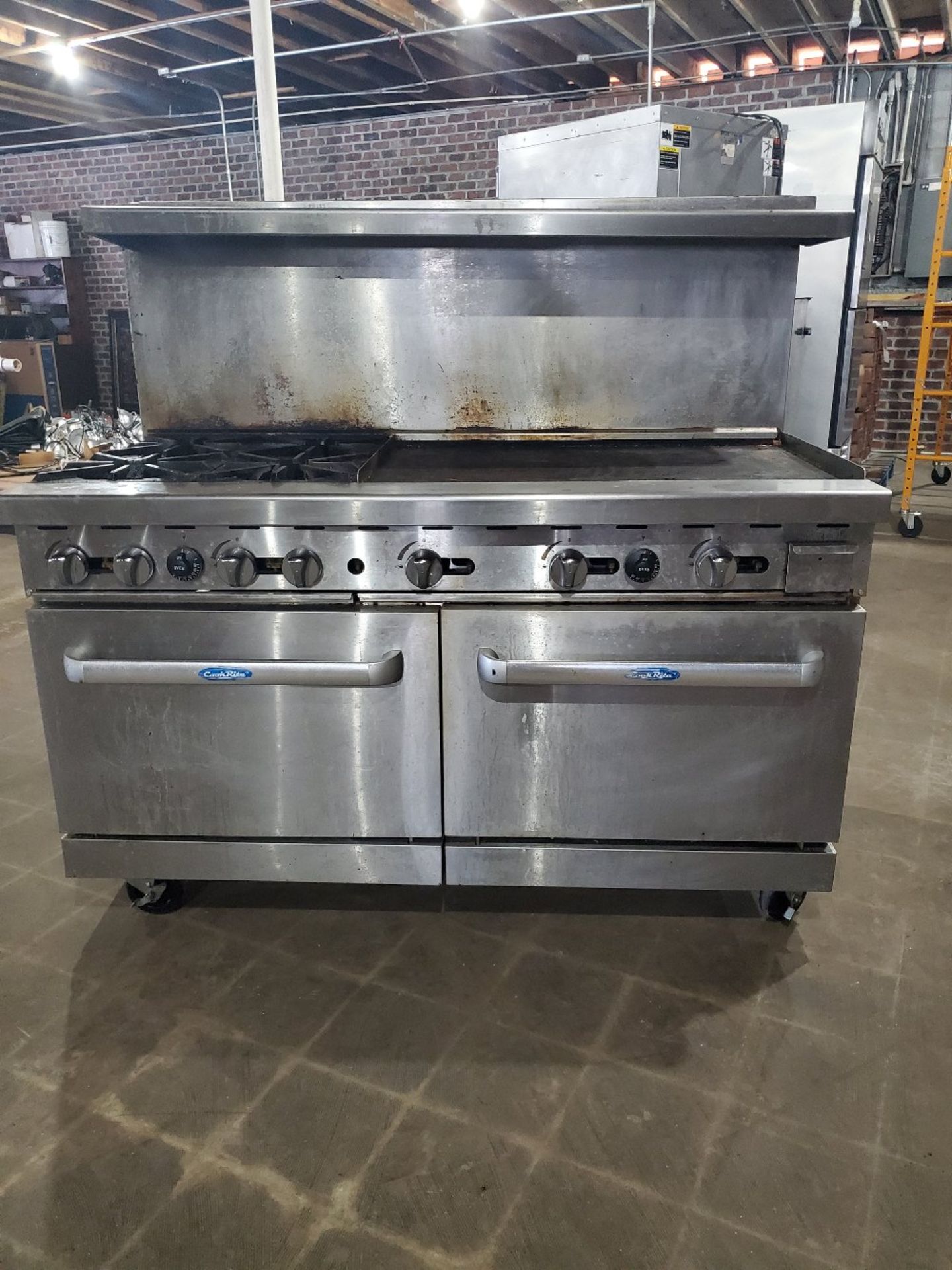 Cook rite commercial range 4 burner , flat top , double oven Natural gas Unit will be cleaned