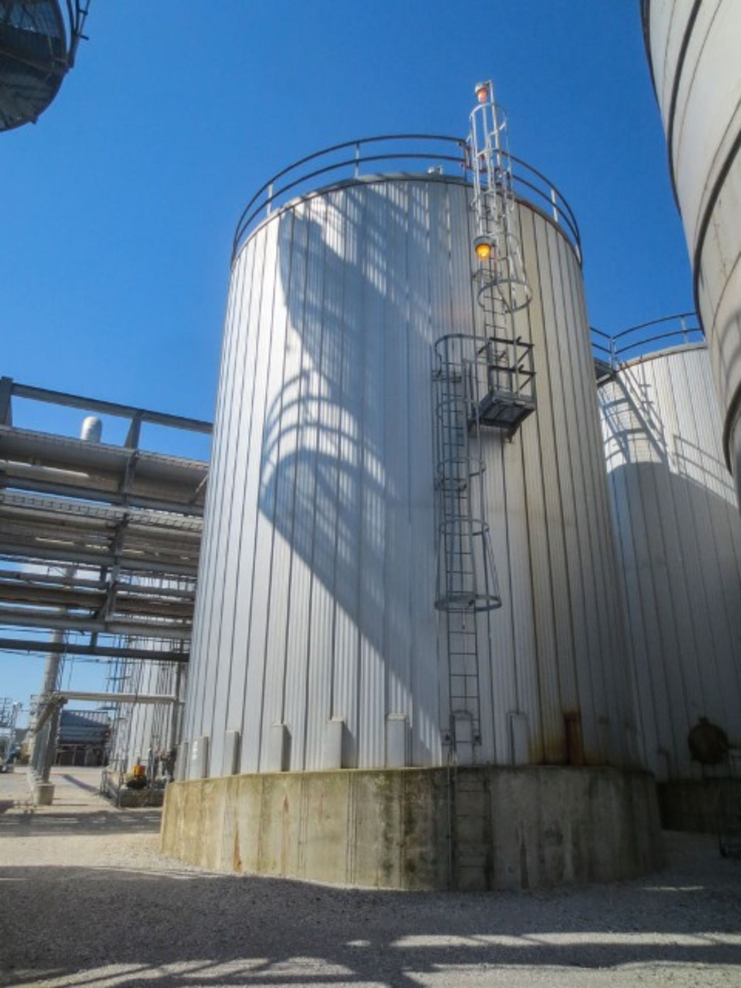 Vertical tank stainless steel 304 AP 650I rated. MAWP at 0.25 psig at 300F. Size is 28'-6" dia x 38'