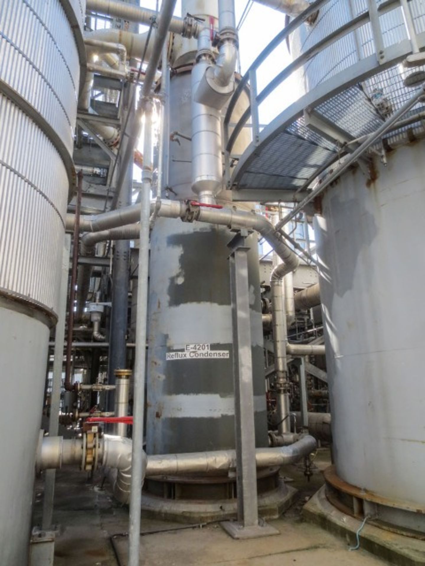 Condenser. Heat exchanger vertical shell & tube design with skirt. 1 pass. Size 32" OD x 72" OD x