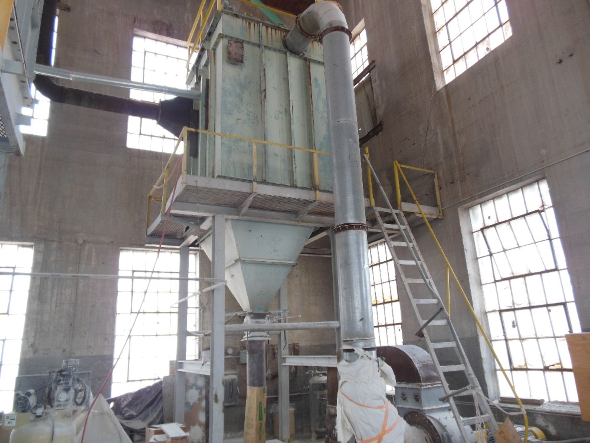 Amano dust collector, model # WRT-5096; rated 10,000 cfm; pulse jet cleaning system; 30Hp premium