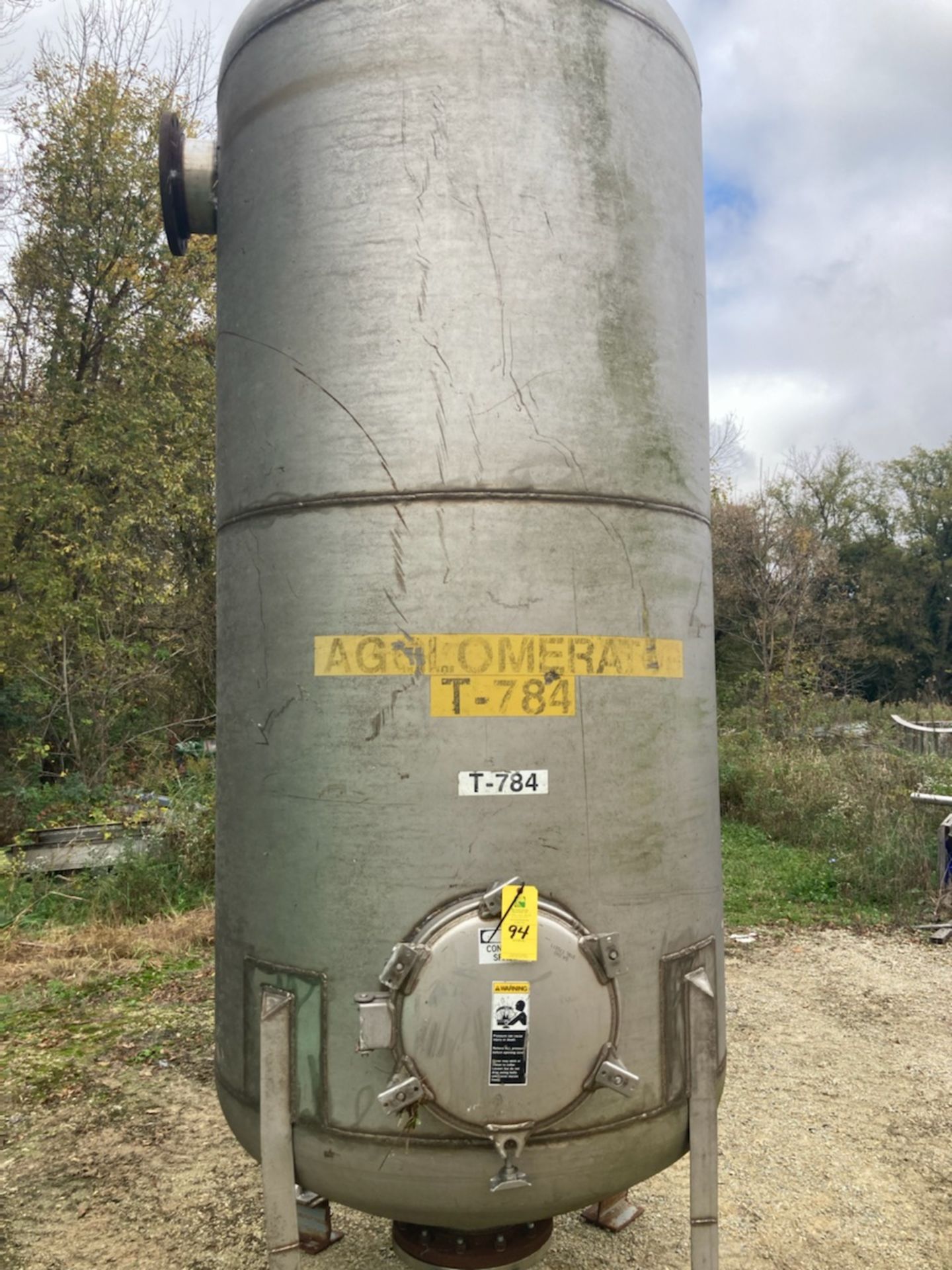 Stainless Steel Tank with Manway - Approximate 825 Gallons. RIGGING/LOADING FEE $150
