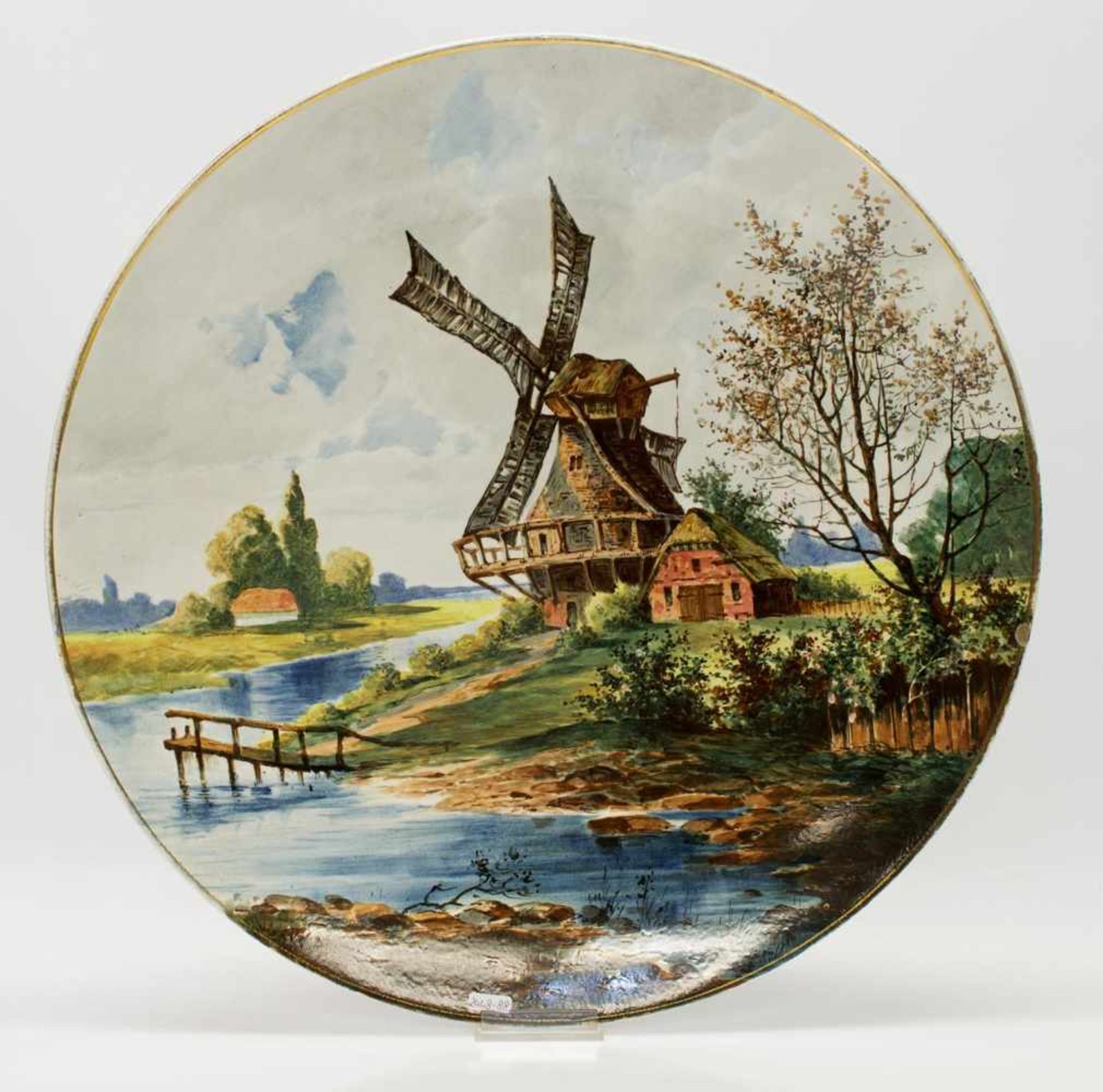 Wandteller1920er Jahre, handgemalte Vedute mit Mühle, Goldrand (berieben), D. 45 cm,