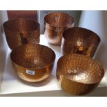 8 Copper Dishes.