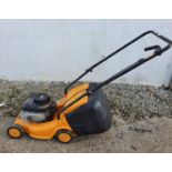 A good McCulloch 450 CP Motor Mower with grass box