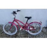 A 20" Pink our generation Girls Bicycle with mudguards and carrier