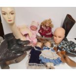 A quantity of items to include ice skates and dolls.