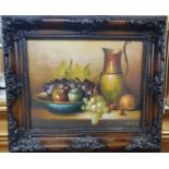 An Oil On Board Still Life of fruit in a bowl and jug signed indistinct LR.24.5 x 20 cms.