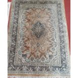 A good brown ground Rug with multi borders and all over design. 223 X 156 cms.