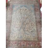 An Early 20th Century Rug with the tree of life design.182 x 138 cms