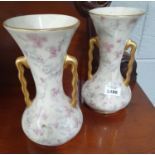 A pair of Early 20th Century Vases with floral and gilt decoration.
