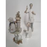 A group of Lladro Figures ( slight damage as candle holder needs regluing).