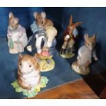 A group of Royal Albert Beatrix Potter figures.