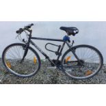 A Trek multi track 700 mens rigid bicycle